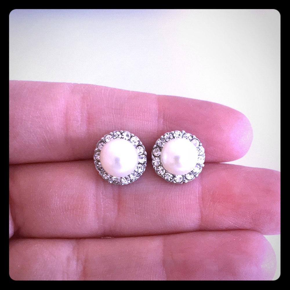 Faux diamond and pearl earrings.
